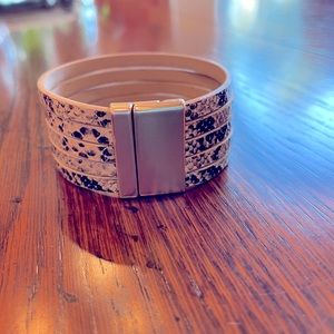 Snake print, perforated bracelet with magnetic silver clasp
